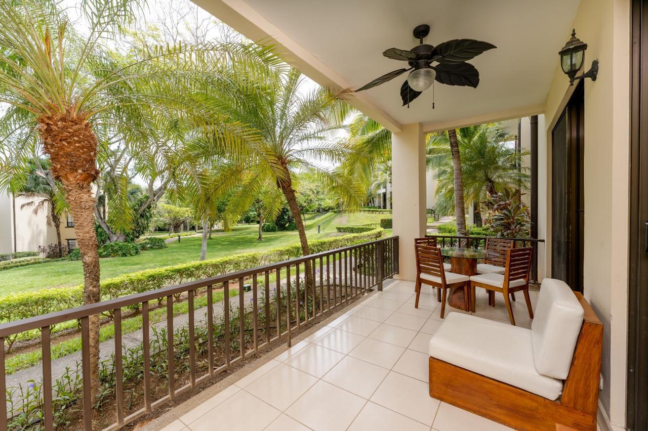 Luxury apartment balcony with tropical garden view in Playas del Coco