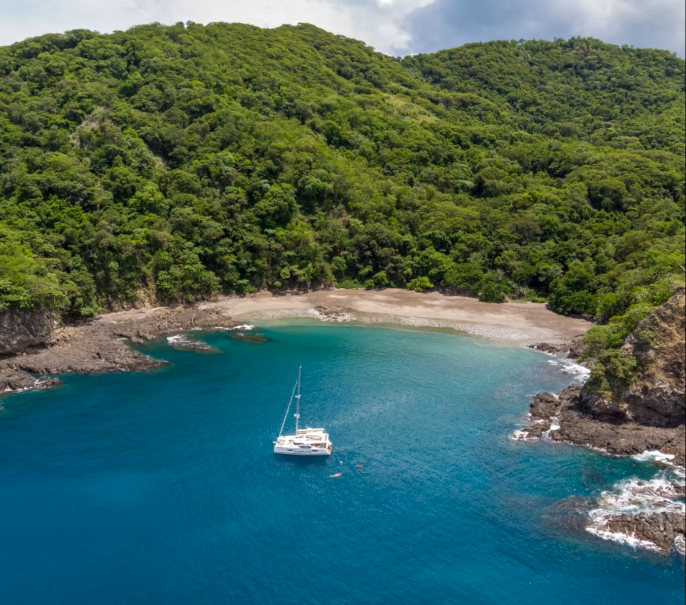 Pristine Costa Rican beach cove with turquoise waters